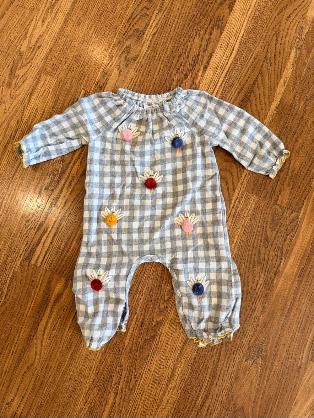 Mud Pie Blue Gingham One-Piece Romper with Multicolor Flower Appliqués